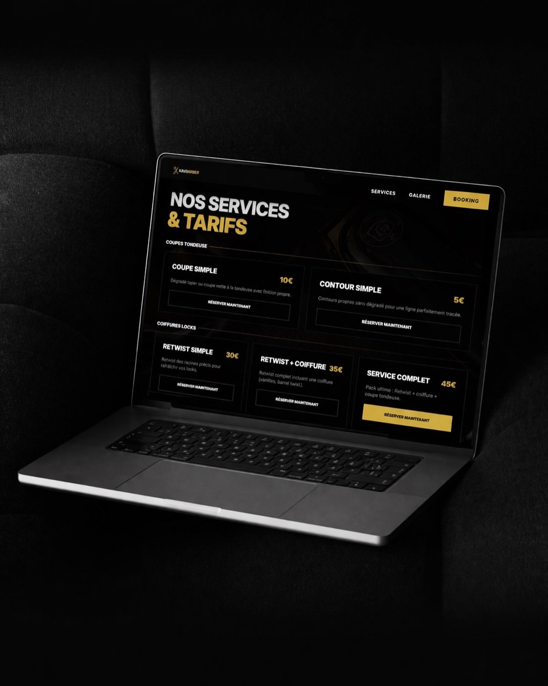 Le site Xav Barber affiché sur un ordinateur